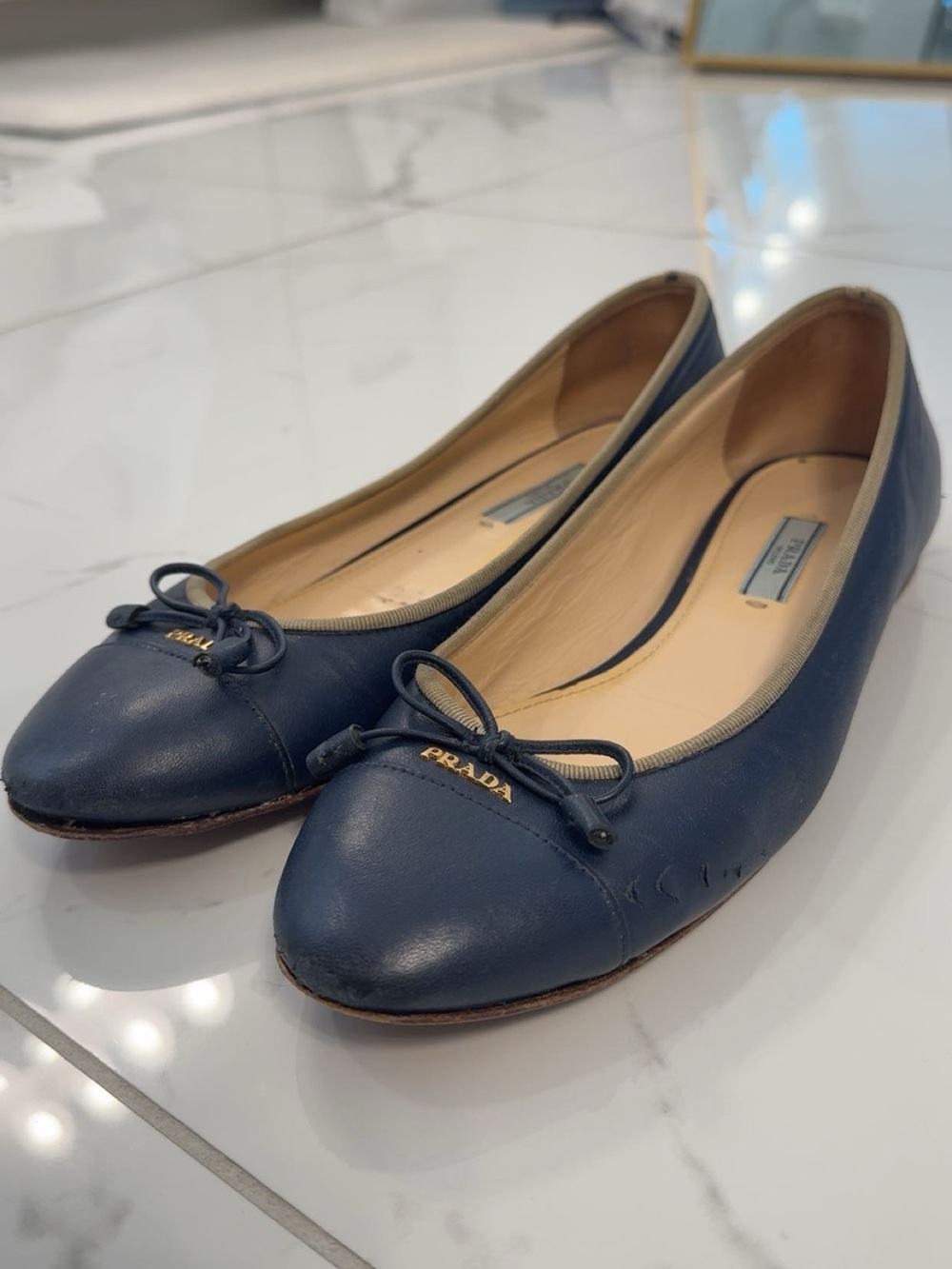 Prada Navy Leather Bow Ballet Flats with Gold Logo